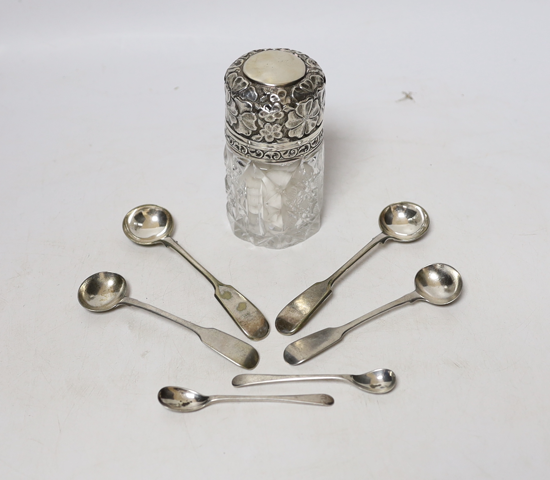 Four silver mustard ladles, including two 19th century, two plated ladles and an Edwardian silver mounted glass salts jar, London, 1905, 94mm.